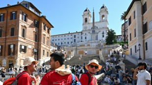 Thousands of young Catholics  converge for grand Pope Leo vigil