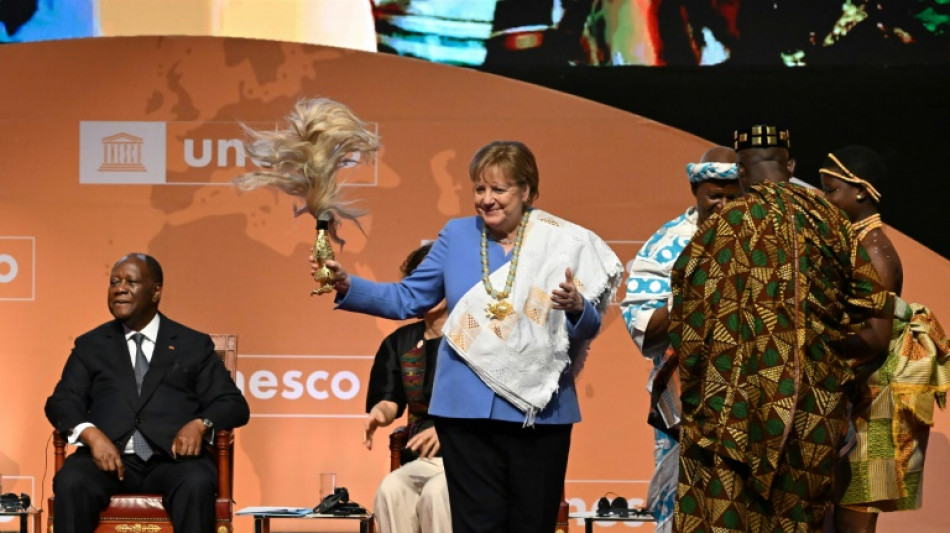 Merkel in Elfenbeinküste mit Unesco-Friedenspreis geehrt