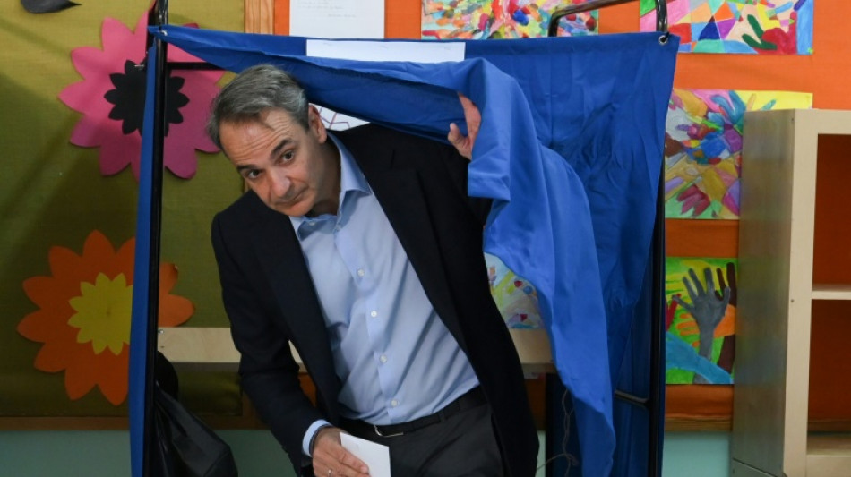 Mitsotakis urges 'stronger' Greece as uncertain vote gets underway