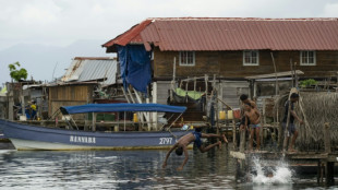 Year after exodus, silence fills Panama island threatened by sea