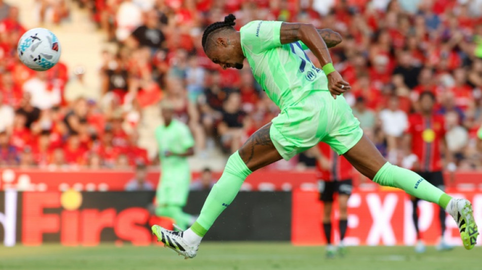 Barcelona open Liga title defence strolling past nine-man Mallorca