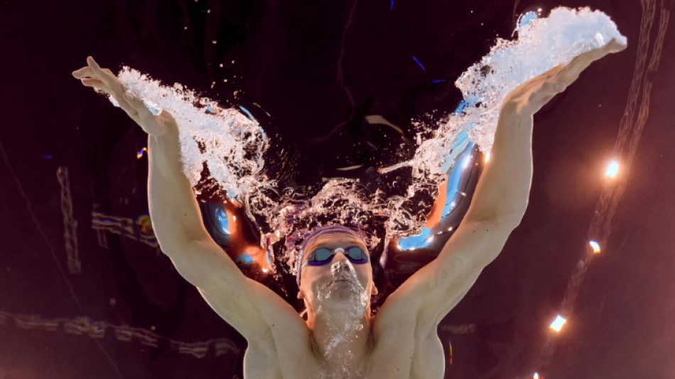 Olympic champion Marchand to focus on medleys at worlds