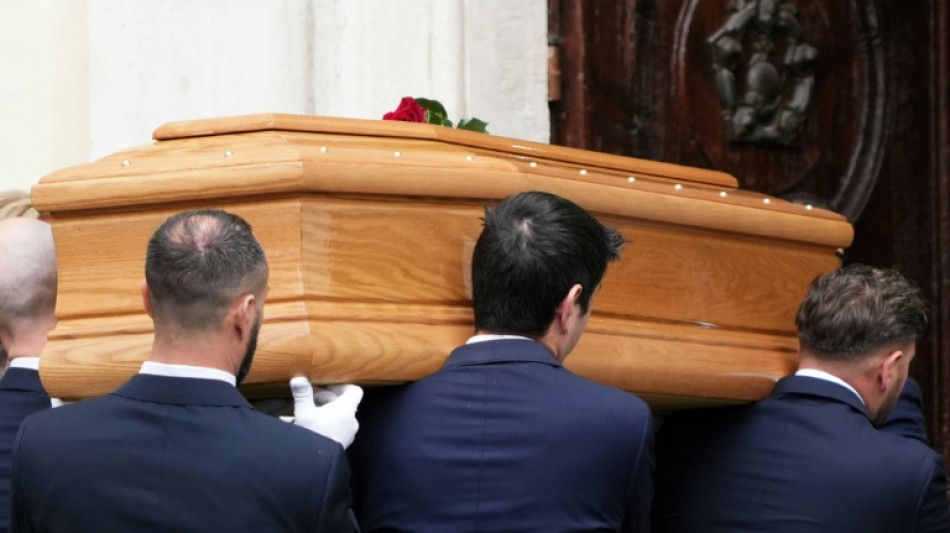 Mourners pay last respects to Italian icon Valentino