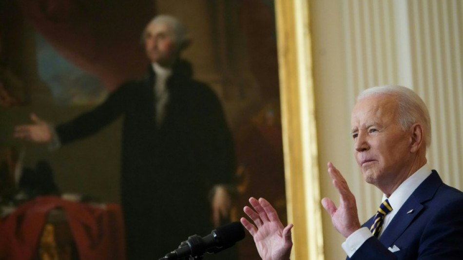 Biden touts 'enormous progress' in pandemic-blighted first year