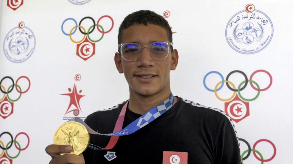 Nadador tunisiano Hafnaoui, ouro olímpico em 2021, é suspenso por 21 meses