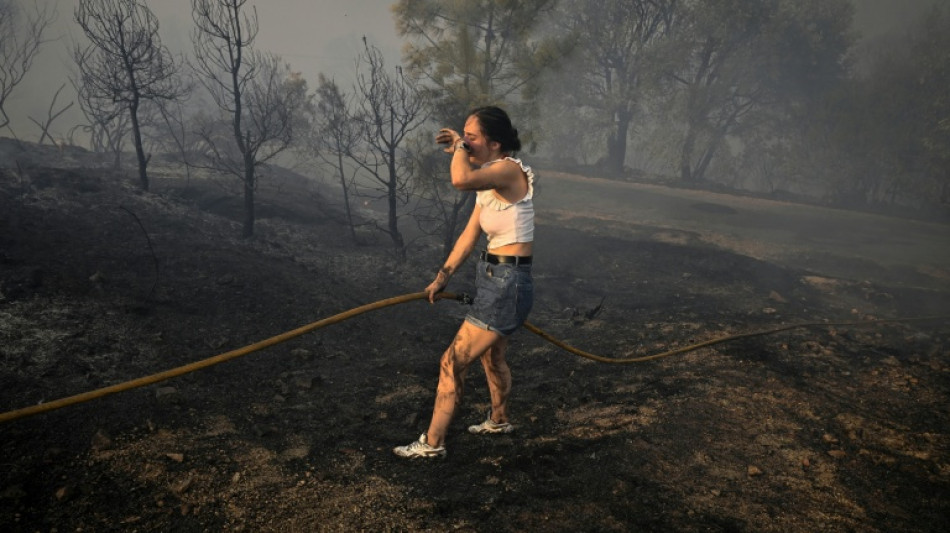Spain suffers third wildfire death, Greece beats back flames