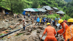 13 killed in India floods, stranded pilgrims airlifted