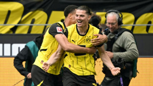 Borussia Dortmund vence Kiel (3-0) e conquista &uacute;ltima vaga na Liga dos Campe&otilde;es