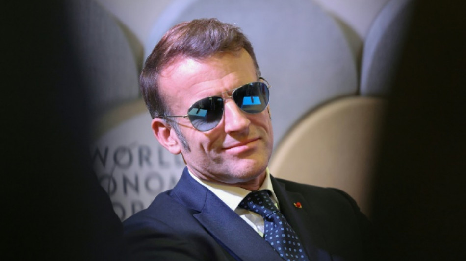 Macron squares up to Trump in rebel shades at macho Davos gathering