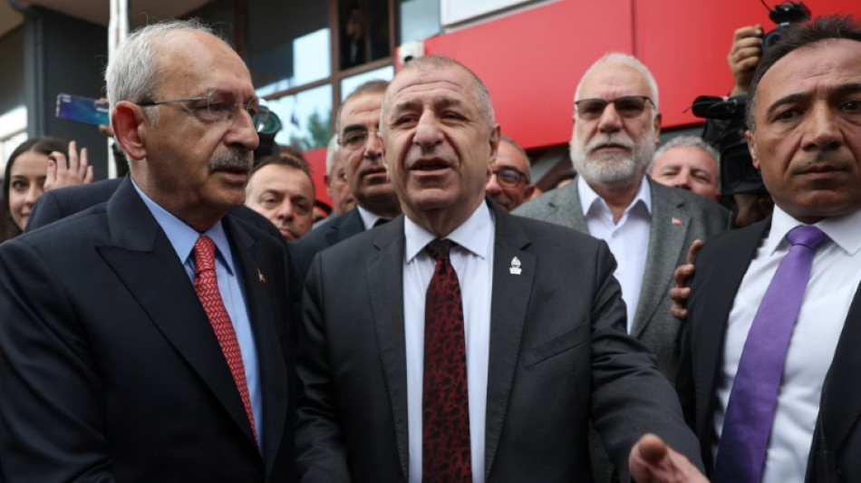 Turkey's pro-Kurdish party keeps faith in Erdogan rival
