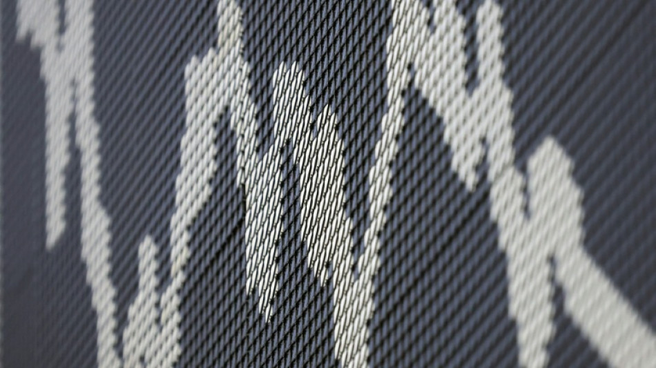 Stocks diverge with eyes on key economic data