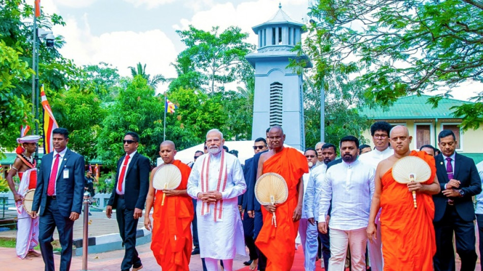 India's Modi praises close Sri Lanka ties at holy tree