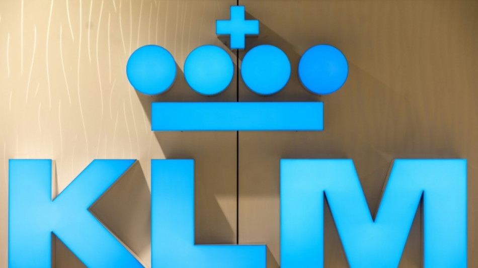 KLM cancels flights as crowds jam Amsterdam's Schiphol