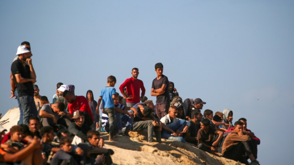 'Full of sorrow': Gazans trek home as truce begins