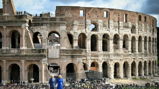 Charles and Camilla pose at Colosseum in pomp-filled Italy visit