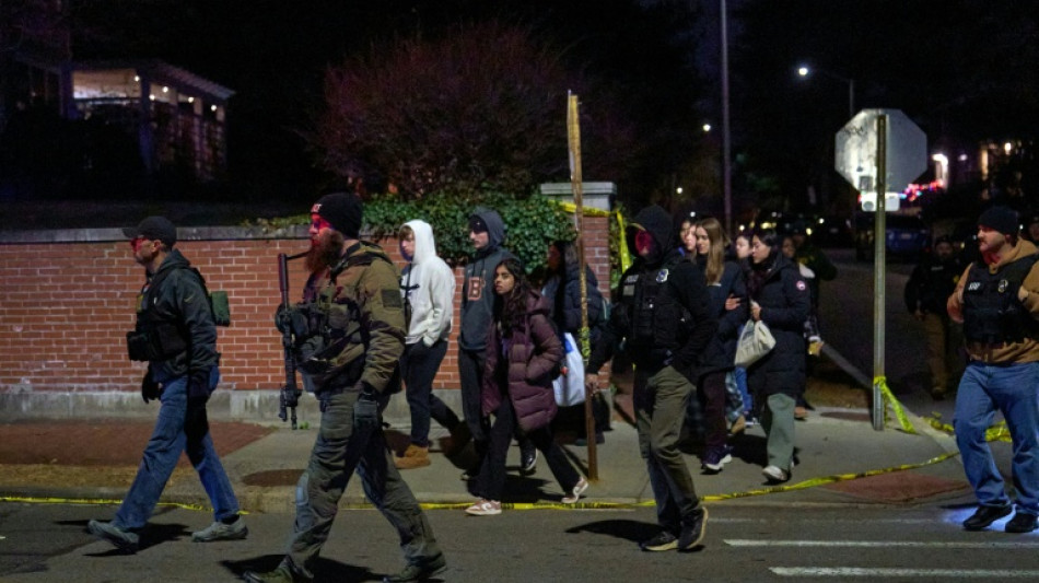 Police hunt gunman who killed two at US university