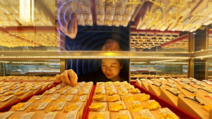 Stocks pull lower at end of record year for markets