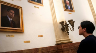 Artist of 'distorted' portrait says Trump complaint harming business