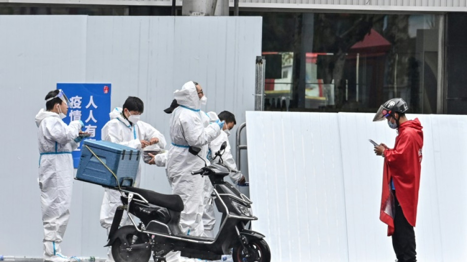 A Shanghai, une "arm&eacute;e" de livreurs ravitaille les confin&eacute;s