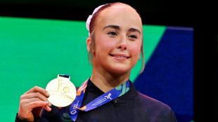 Pease spins to floor gold as US tops gymnastics medal table