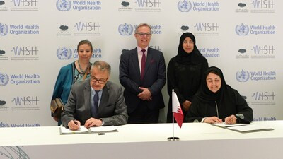 Dr Tedros Adhanom Ghebreyesus (seated left) , Director General, WHO, and Sultana Afdhal, CEO, WISH, sign a collaboration agreement at Qatar Foundation’s headquarters, witnessed by Her Excellency Dr Hanan Mohamed Al Kuwari (top right), Minister of Public Health in Qatar, and representatives of WHO.